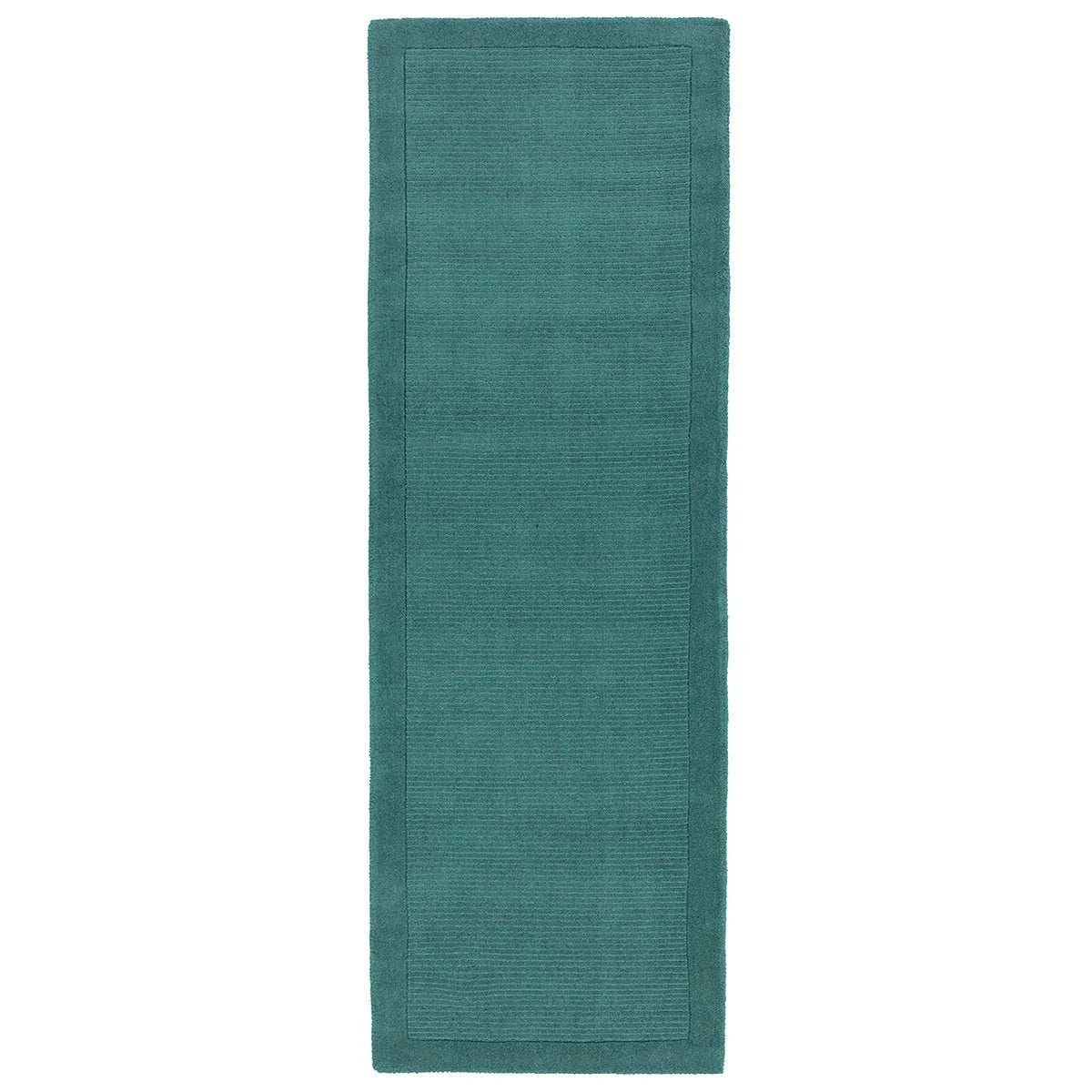 Asiatic York Teal runner rug styled in a living room