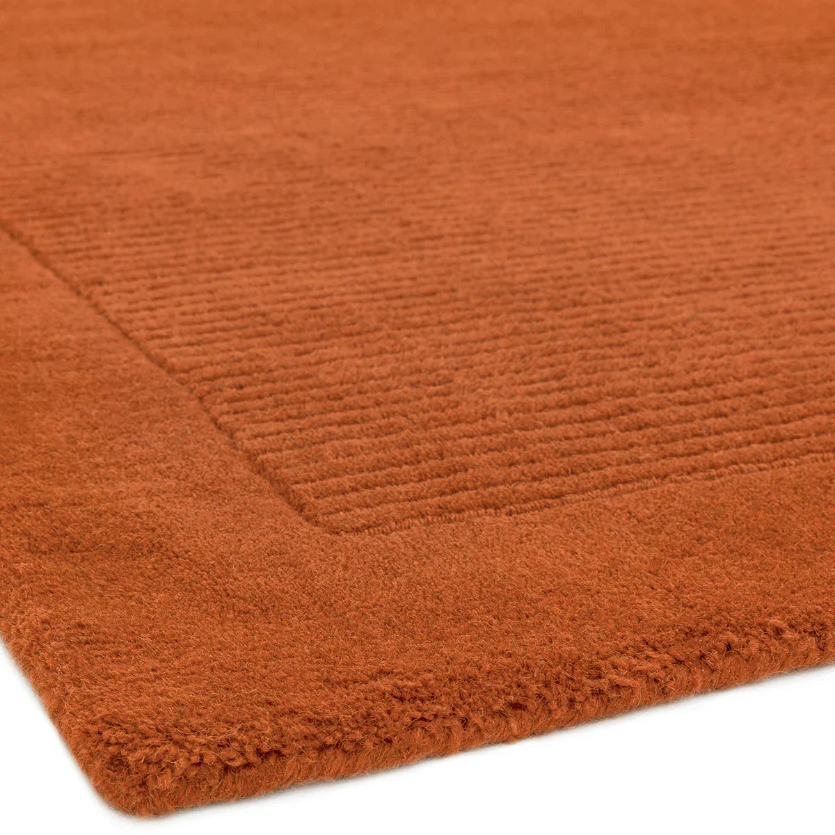 Asiatic York Terracotta Runner featuring ribbed texture in orange and terracotta on white background, hand-tufted wool
