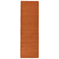 Asiatic York Terracotta runner rug styled in a living room