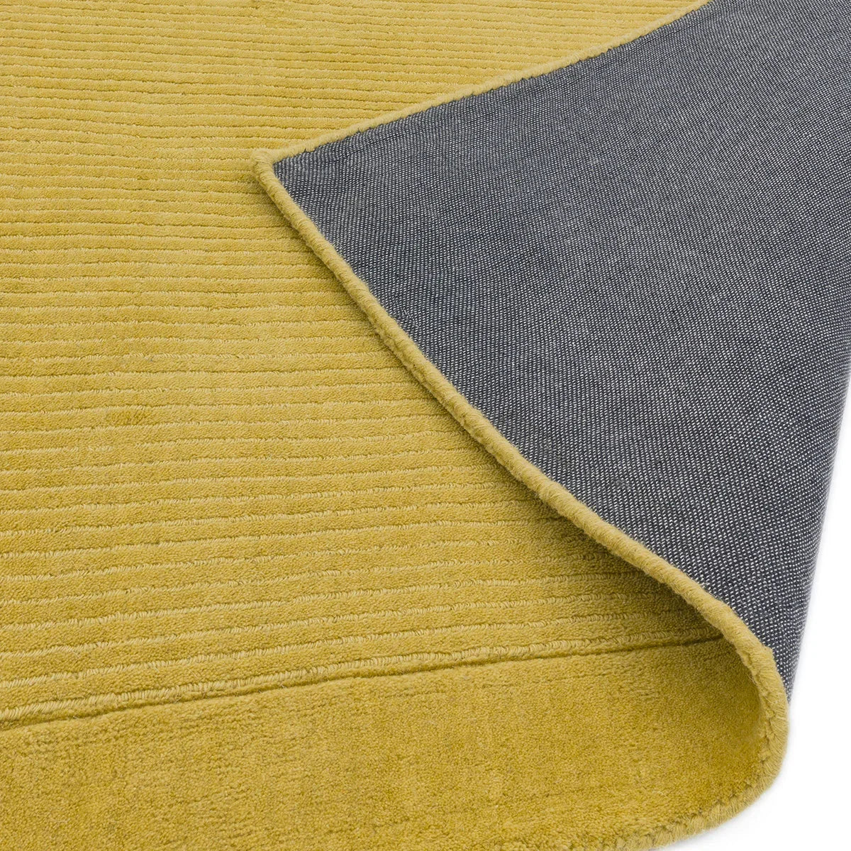 Asiatic York Yellow Designer Rug featuring textured striped pattern in mustard yellow on grey backing, hand-tufted wool