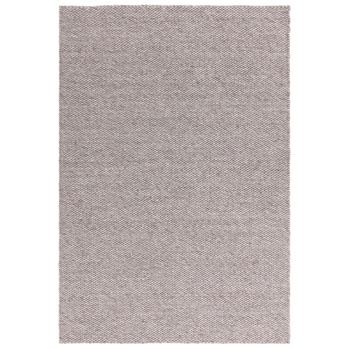 Asiatic Zander Charcoal rectangle rug styled in a living room