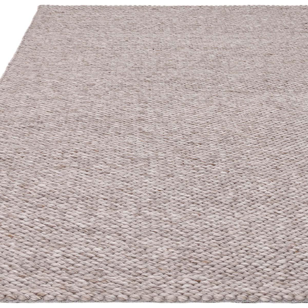 Asiatic Zander Charcoal Designer Rug featuring chunky woven texture in charcoal, taupe and beige on a light beige background, hand-woven wool