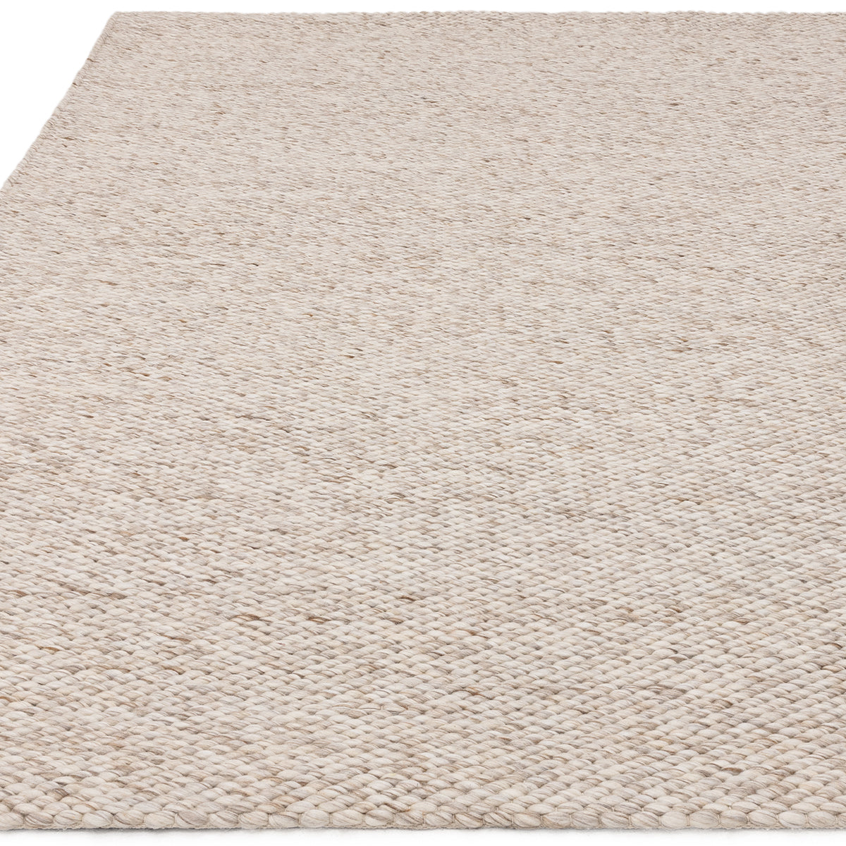 Beige woven rug with a textured pattern