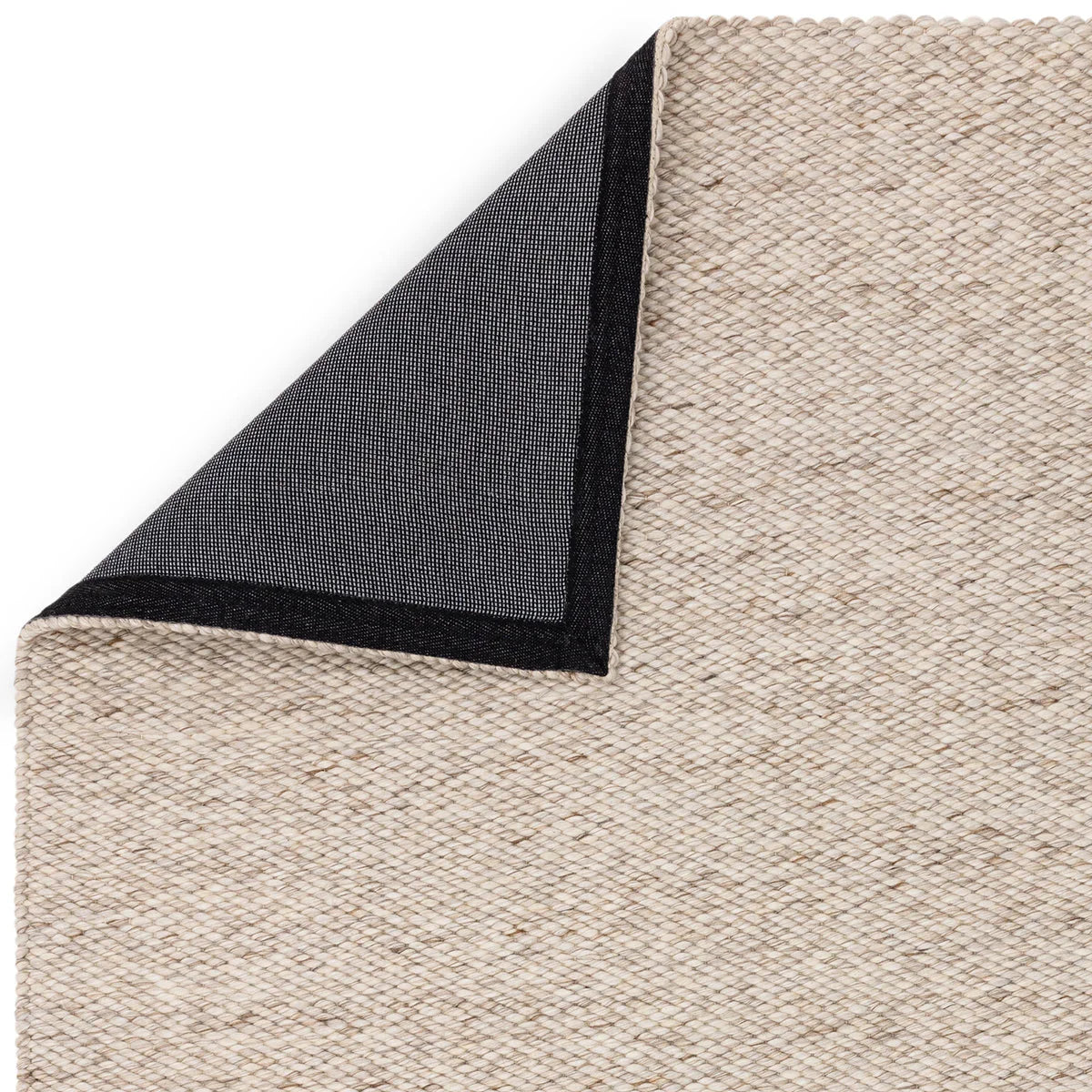 Asiatic Zander Oyster Rug featuring textured weave in oyster beige and navy on natural background, hand-tufted wool