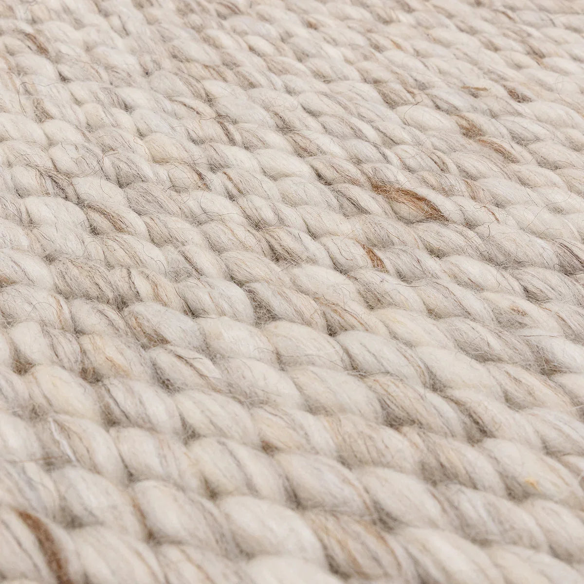 Asiatic Zander Oyster Rug featuring textured chunky weave in oyster, cream and taupe on cream background, handwoven wool