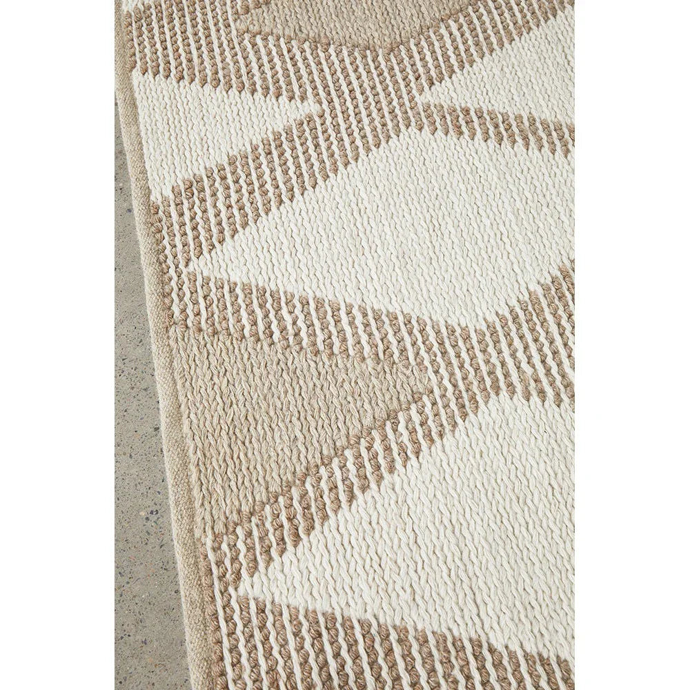 Avalon Shelly Natural Rug featuring geometric chevron pattern in cream, beige and taupe on natural background, hand-tufted wool