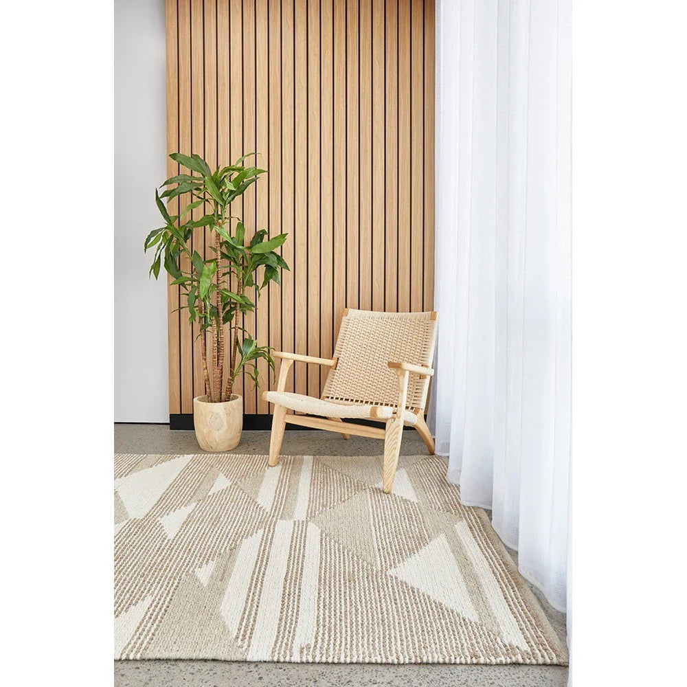 Avalon Taylor Natural Rug featuring geometric triangle pattern in cream, beige and taupe on cream background, handwoven jute