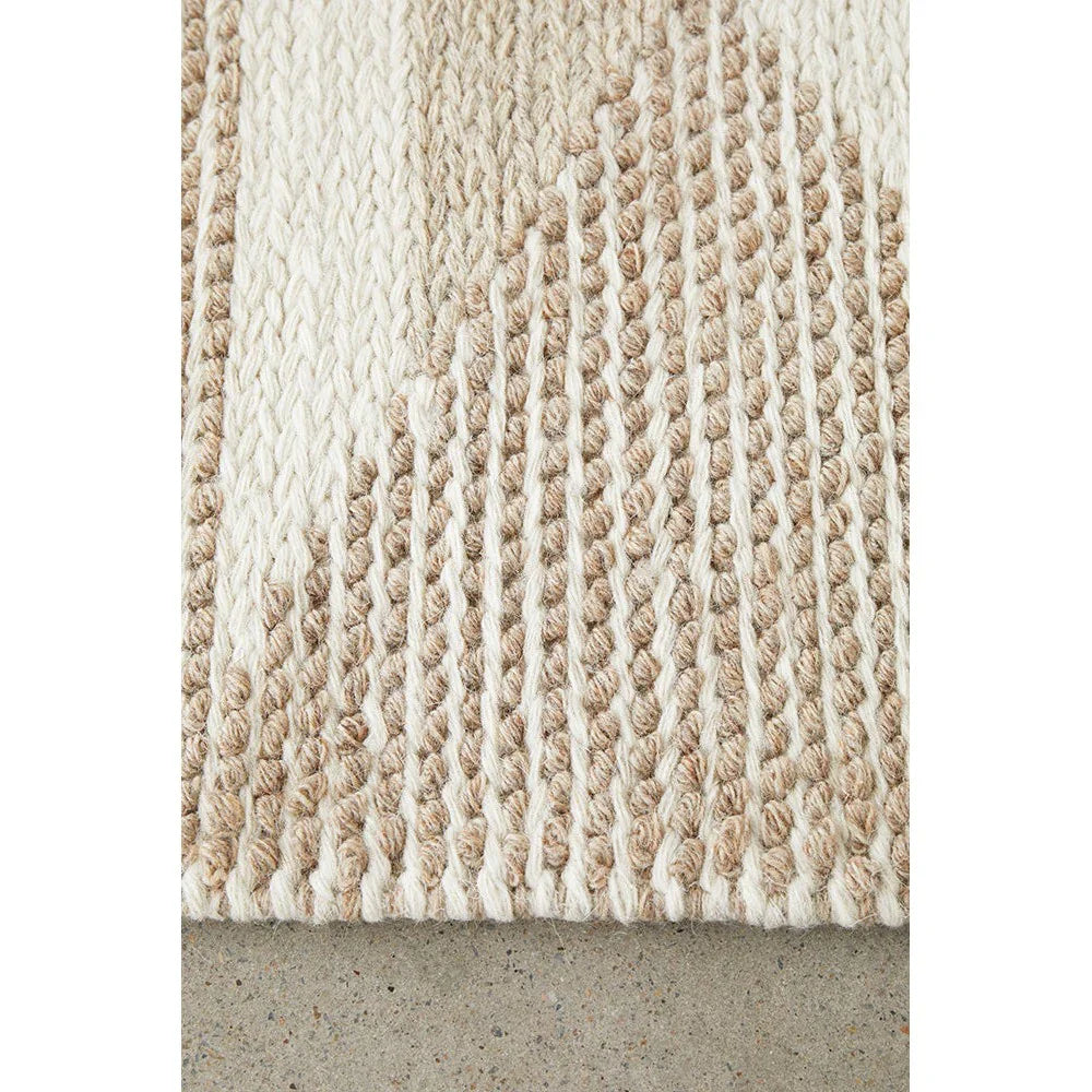Avalon Taylor Natural Rug featuring boucle stripe pattern in cream, beige and tan on ivory background, hand-woven cotton