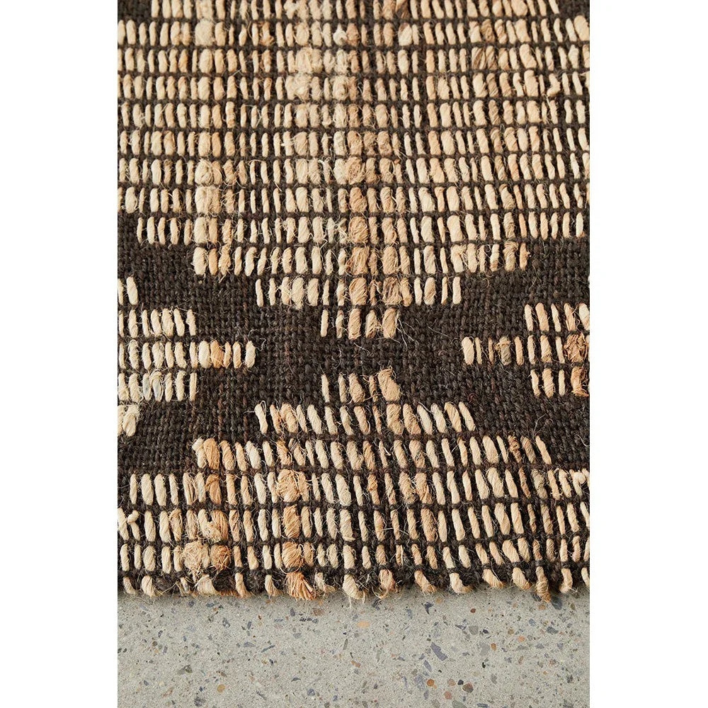Bali Mocha Rug featuring chunky woven pattern in dark chocolate brown and beige on taupe background, hand-woven jute-cotton blend