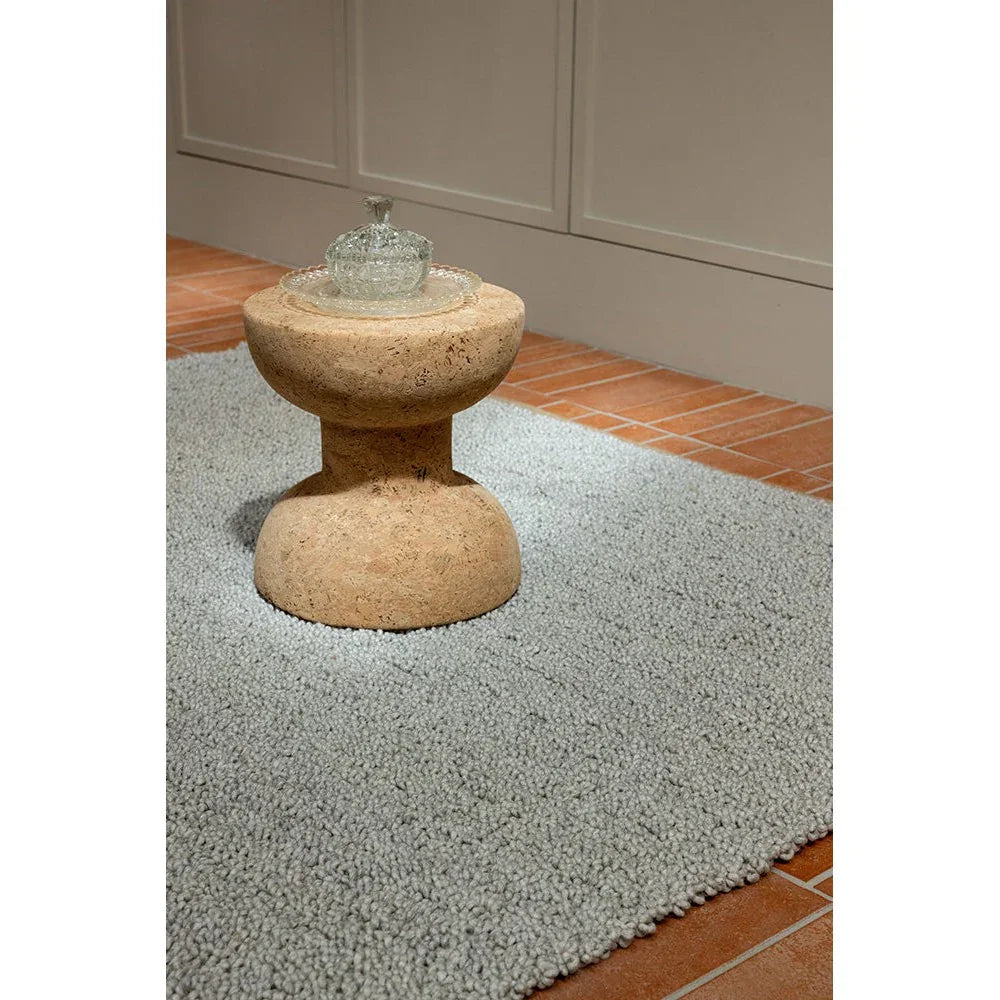 Brink & Campman Bond Ash Designer Rug featuring soft grey shag texture on terracotta tile floor