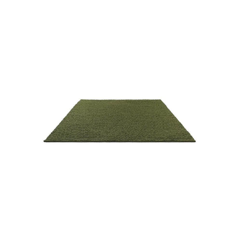 Brink & Campman Bond Moss Designer Rug featuring solid shag texture in moss green on white background, hand-tufted wool