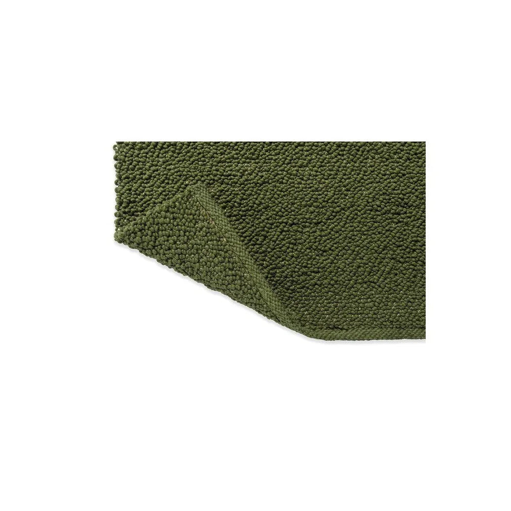 Brink & Campman Bond Moss Designer Rug featuring moss-green shag pile on moss backdrop, hand-tufted wool
