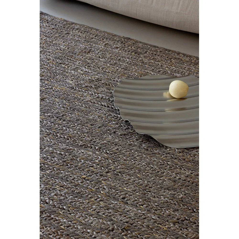 Brink & Campman Craft Plait Stone Designer Rug featuring braided plait pattern in stone, taupe and brown on light beige background, hand-woven wool