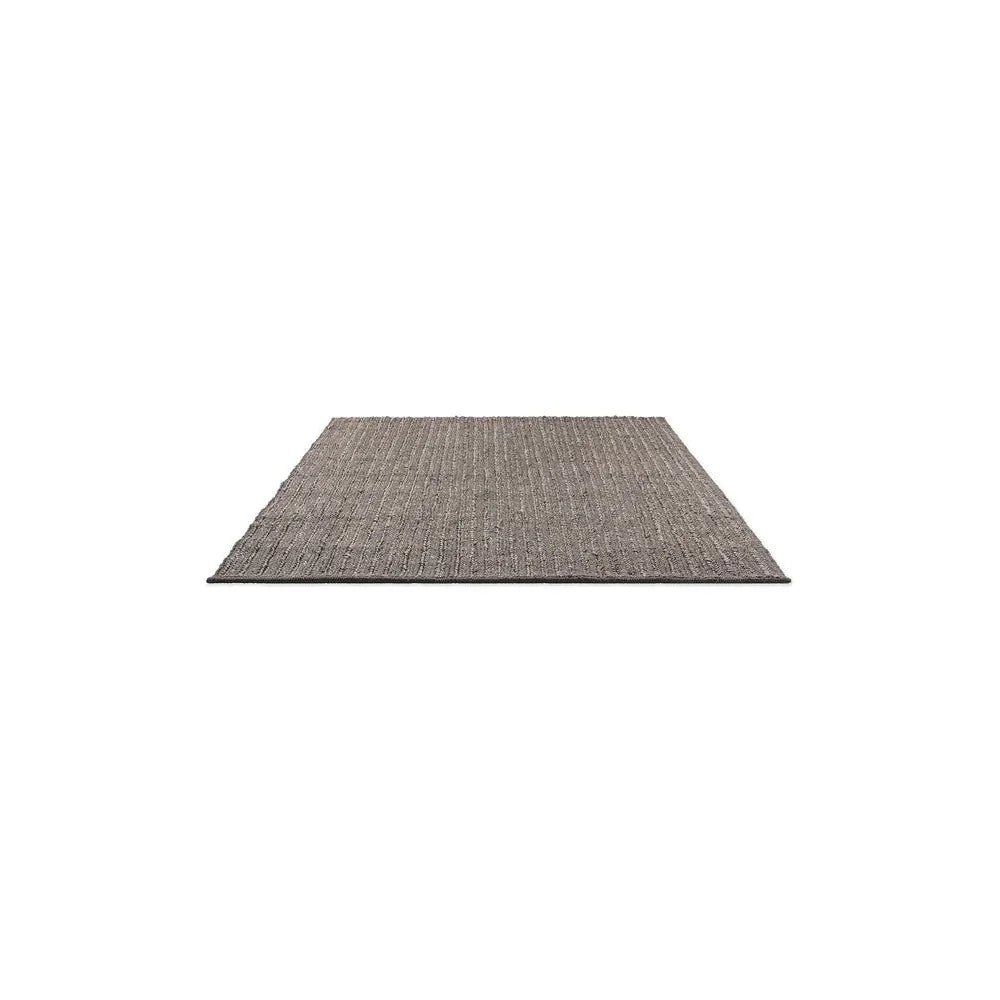 Brink & Campman Craft Plait Stone Designer Rug featuring braided plait texture in stone, taupe and charcoal tones on white background, hand-woven wool