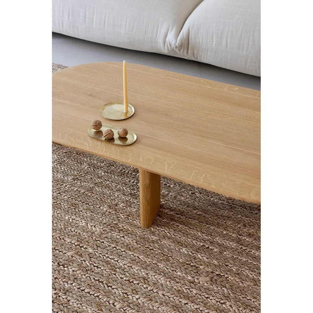 Brink & Campman Craft Plait Natural rug featuring braided plait pattern in natural beige and taupe on light floor, hand-braided jute