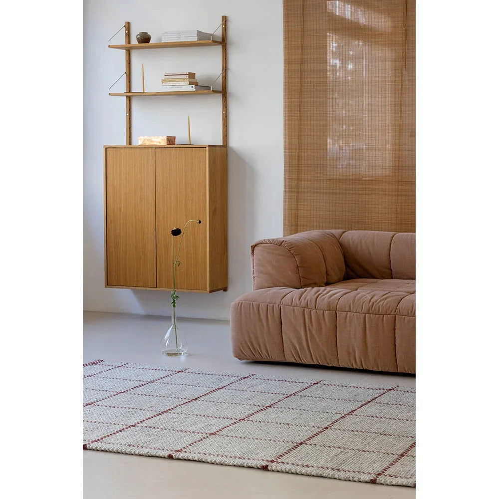 Brink & Campman Craft Matter Check Ash Rug featuring checkered pattern in ivory and brick red on cream background, hand-tufted wool