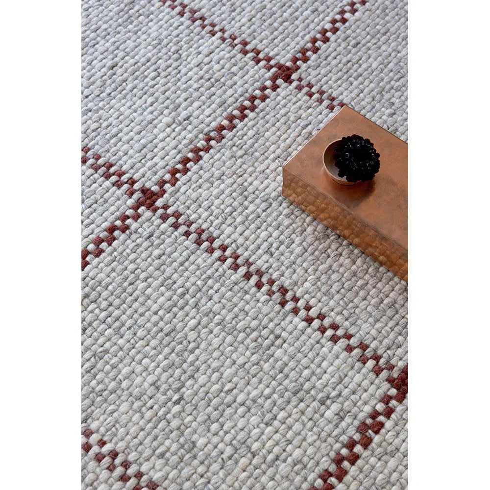 Brink & Campman Craft Matter Check Ash Rug featuring a cream, taupe and rust check pattern on pale ash background, hand-tufted wool