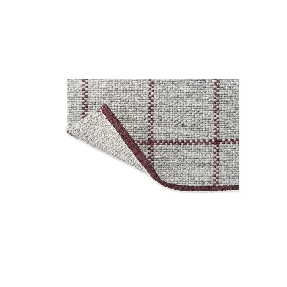 Brink & Campman Craft Matter Check Ash Designer Rug featuring burgundy check grid on light grey background, machine-made wool