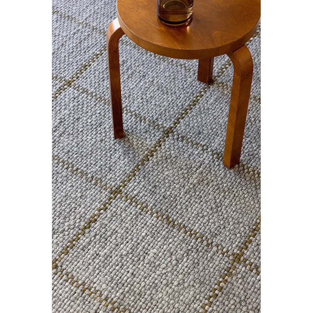 Brink & Campman Craft Matter Check Slate rug featuring a check pattern in slate grey, light grey and mustard on pale beige background, hand-tufted wool