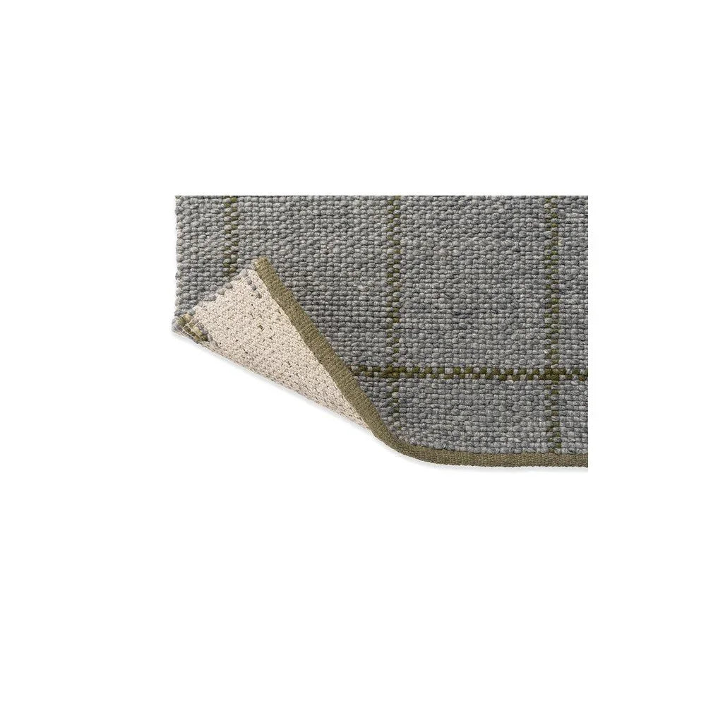 Brink & Campman Craft Matter Check Slate rug featuring a grey check pattern in slate and olive green on light-grey background, power-loomed wool