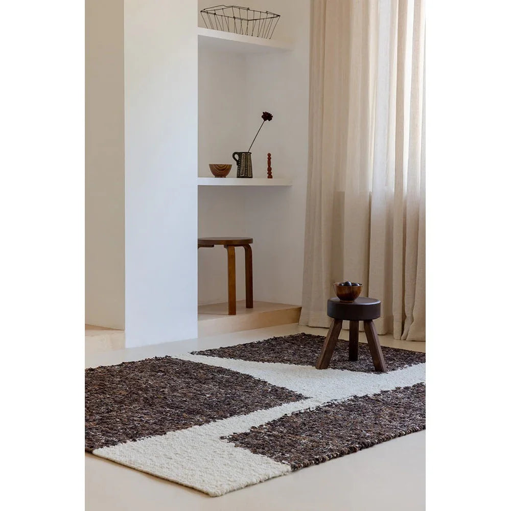 Brink & Campman Craft Fundament Rug featuring chocolate‑cream checker blocks in chocolate brown & cream on cream background, hand‑tufted wool