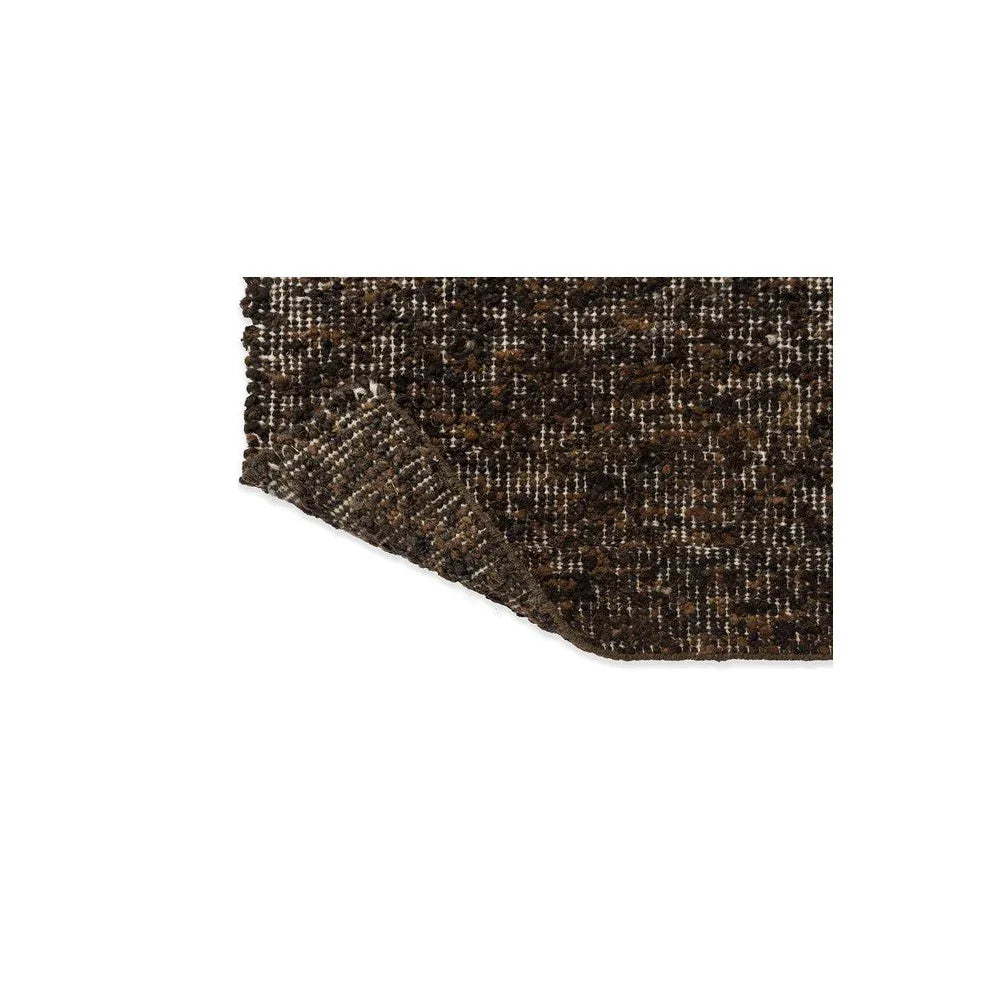 Brink & Campman Craft Fundament rug featuring speckled abstract pattern in chocolate brown, cream and beige on dark brown, hand-tufted wool