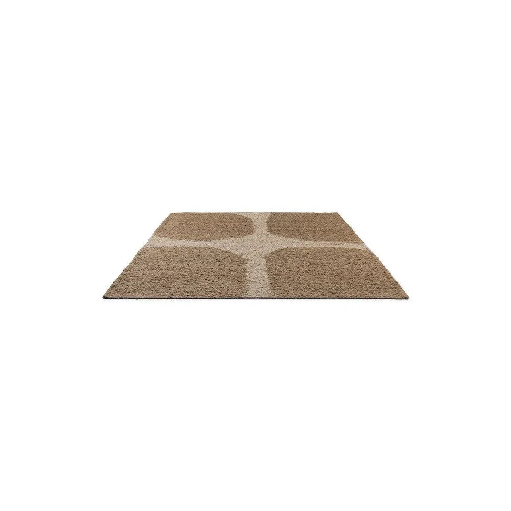 Brink & Campman Craft Fundament Caramel Rug featuring circular motif in caramel and beige on taupe background, hand-tufted wool