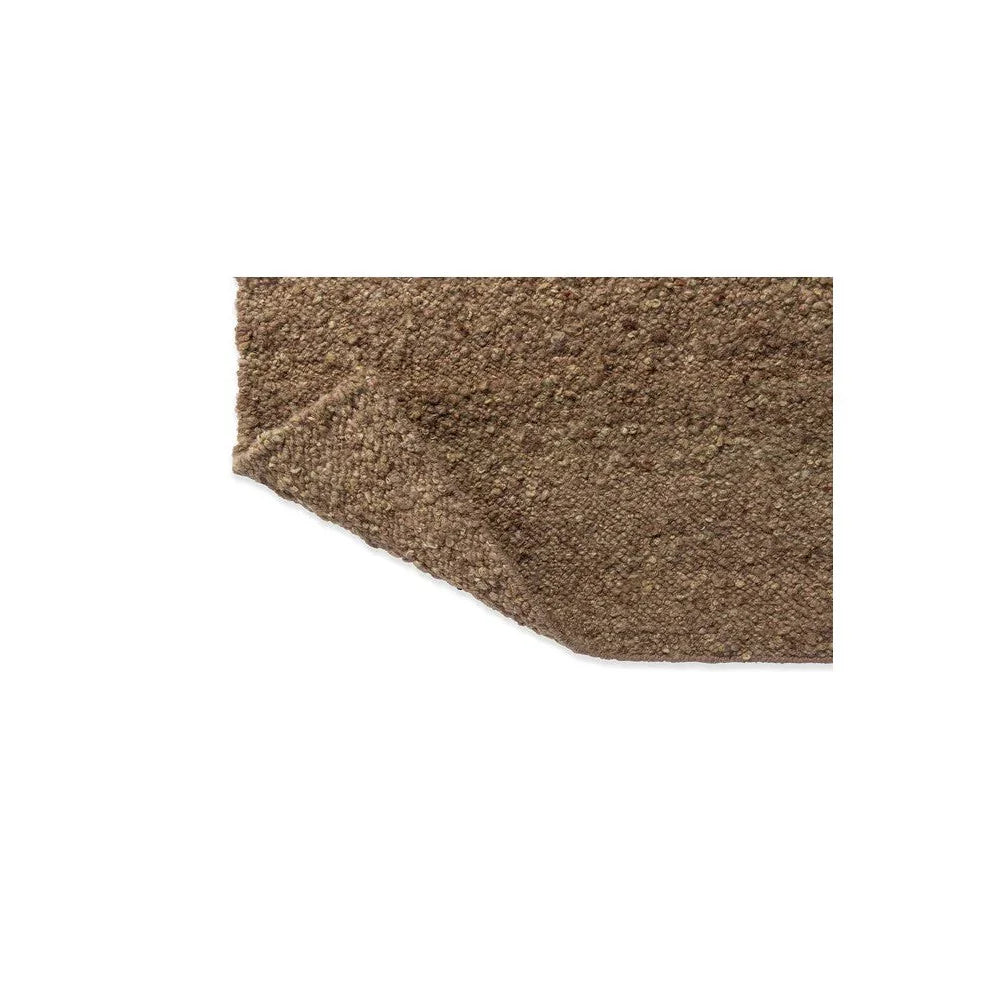 Brink & Campman Craft Fundament Caramel rug featuring solid textured shag in caramel brown with tan and beige on white background, machine-loomed wool