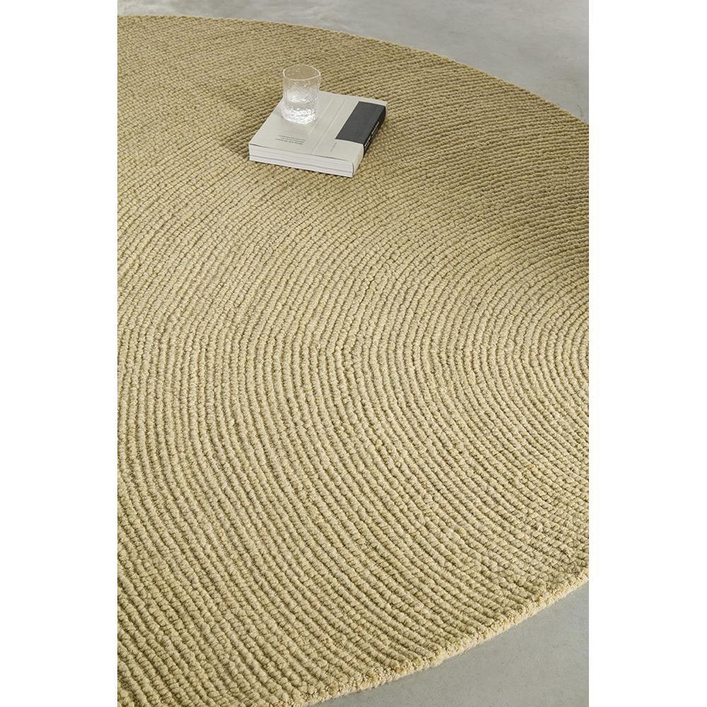 B&C Decor Echo Sand Round Rug featuring concentric braided pattern in warm sand beige on pale grey background, handwoven jute