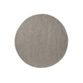 Brink and Campman Decor Echo Pebble round hand-tufted wool rug featuring sculptural raised concentric circles rippling outward in soft pebble grey with textural depth
