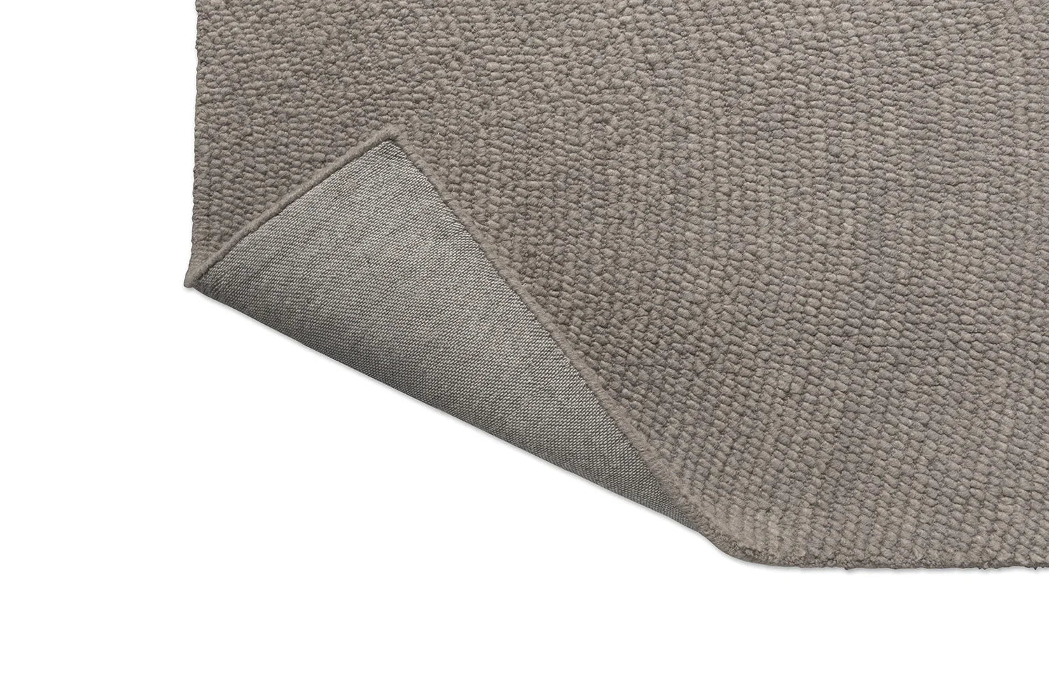 B&C Decor Echo Pebble rug featuring solid textured weave in taupe, beige and cream on light taupe background, hand-tufted wool