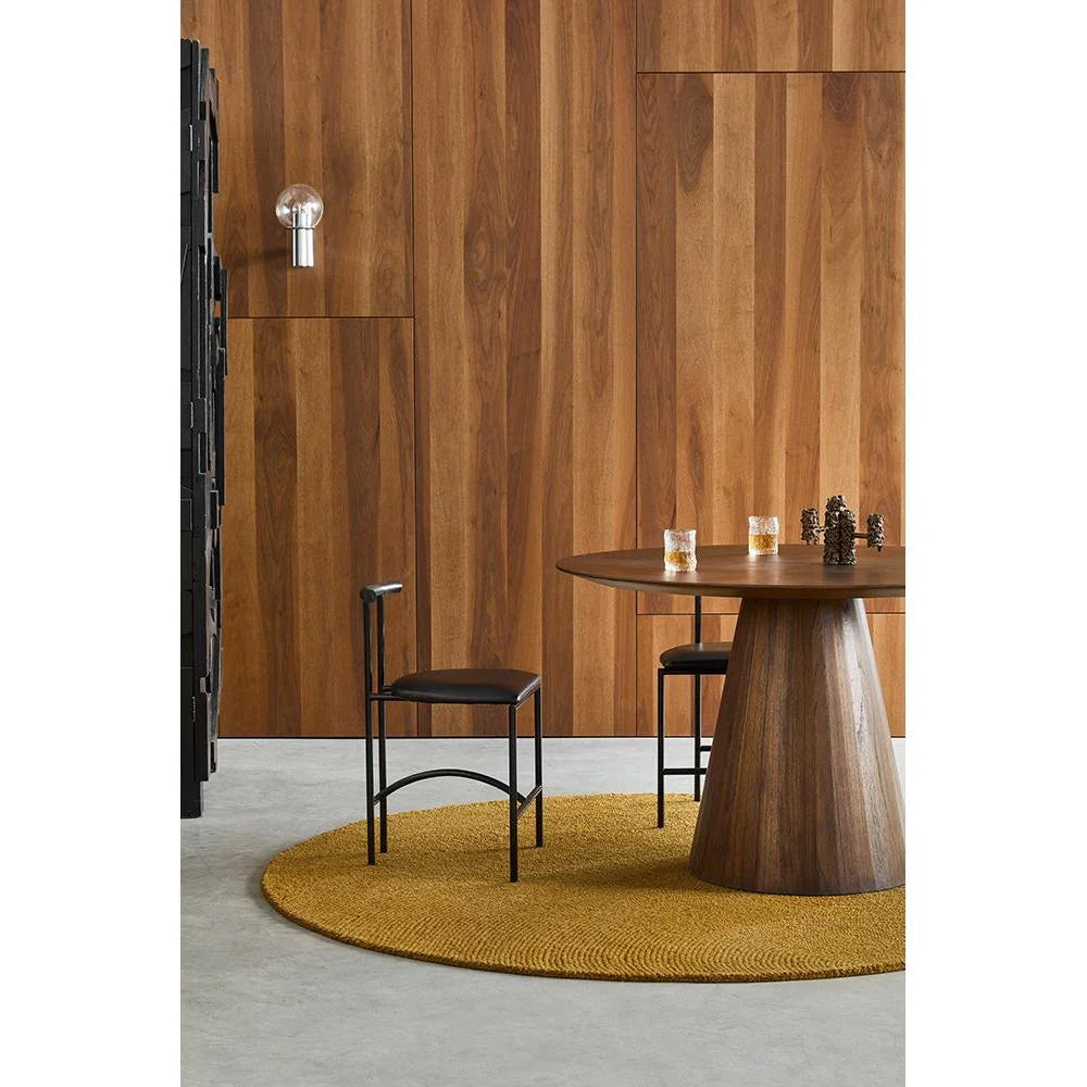 B&C Decor Echo Ochre Round Rug featuring solid circular design in ochre on light grey floor, hand-tufted wool