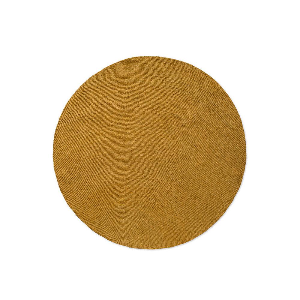 Brink and Campman Decor Echo Ochre round hand-tufted wool rug featuring sculptural raised concentric circles rippling outward in rich golden mustard ochre with textural depth
