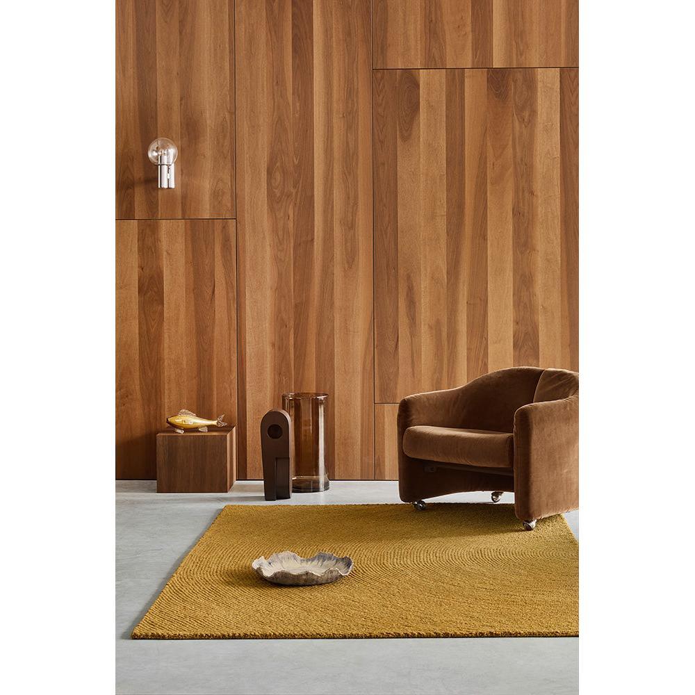 B&C Decor Echo Ochre Designer Rug featuring solid textured weave in ochre on light grey flooring, hand-tufted wool