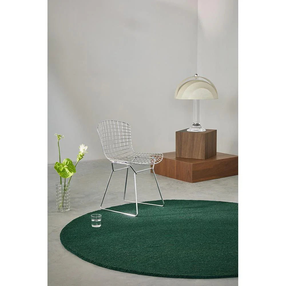 B&C Decor Echo Forest Round Rug featuring solid forest green in round shape on neutral grey floor, machine-made wool
