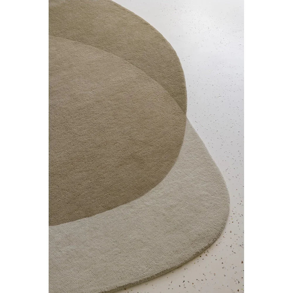 Brink & Campman Element Arp Natural Designer Rug featuring overlapping circular shapes in ivory, cream and taupe on light beige background, wool blend