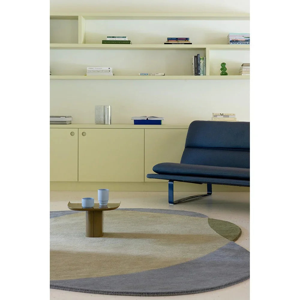 Brink & Campman Element Chad Grey Green Rug with circular geometric pattern in beige, sage, grey and blue on cream, hand-tufted wool
