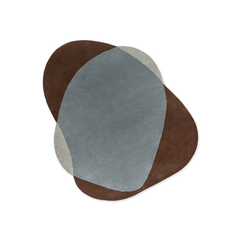 Brink & Campman Element Chad Brown Blue Designer Rug with abstract brown, blue-grey and beige shapes on light background, hand-tufted wool