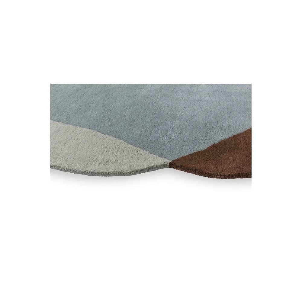Brink & Campman Element Chad Brown Blue Designer Rug featuring abstract geometric pattern in blue-gray, beige and brown on white background, machine-made rug