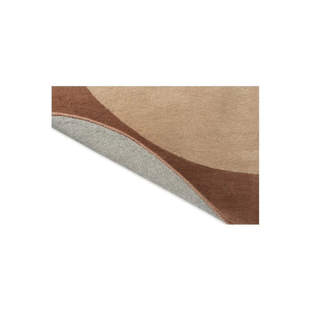 Brink & Campman Element Moore Caramel Rug featuring abstract curved pattern in caramel, taupe, brown and grey on cream background, hand-tufted wool
