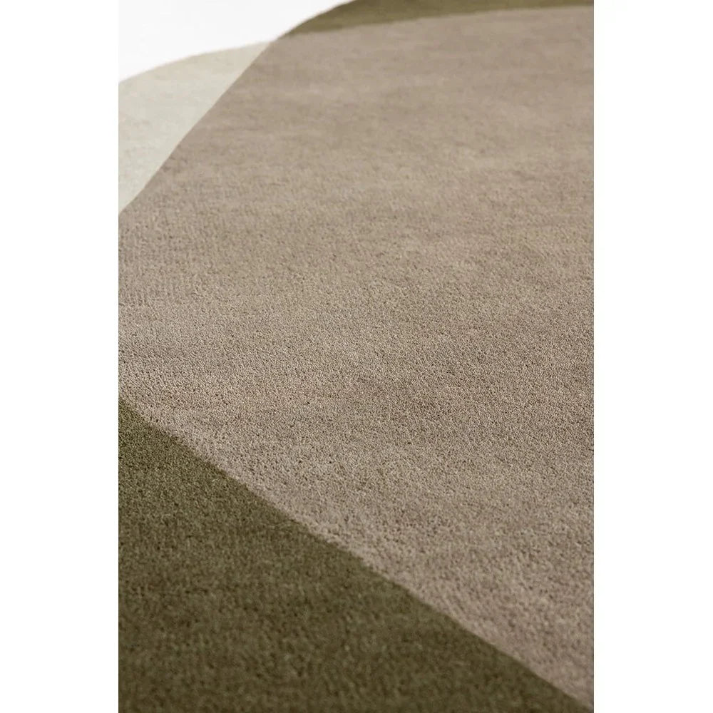 Brink & Campman Element Moore Moss designer rug featuring geometric block pattern in moss green, taupe, beige on warm taupe background, hand-tufted wool
