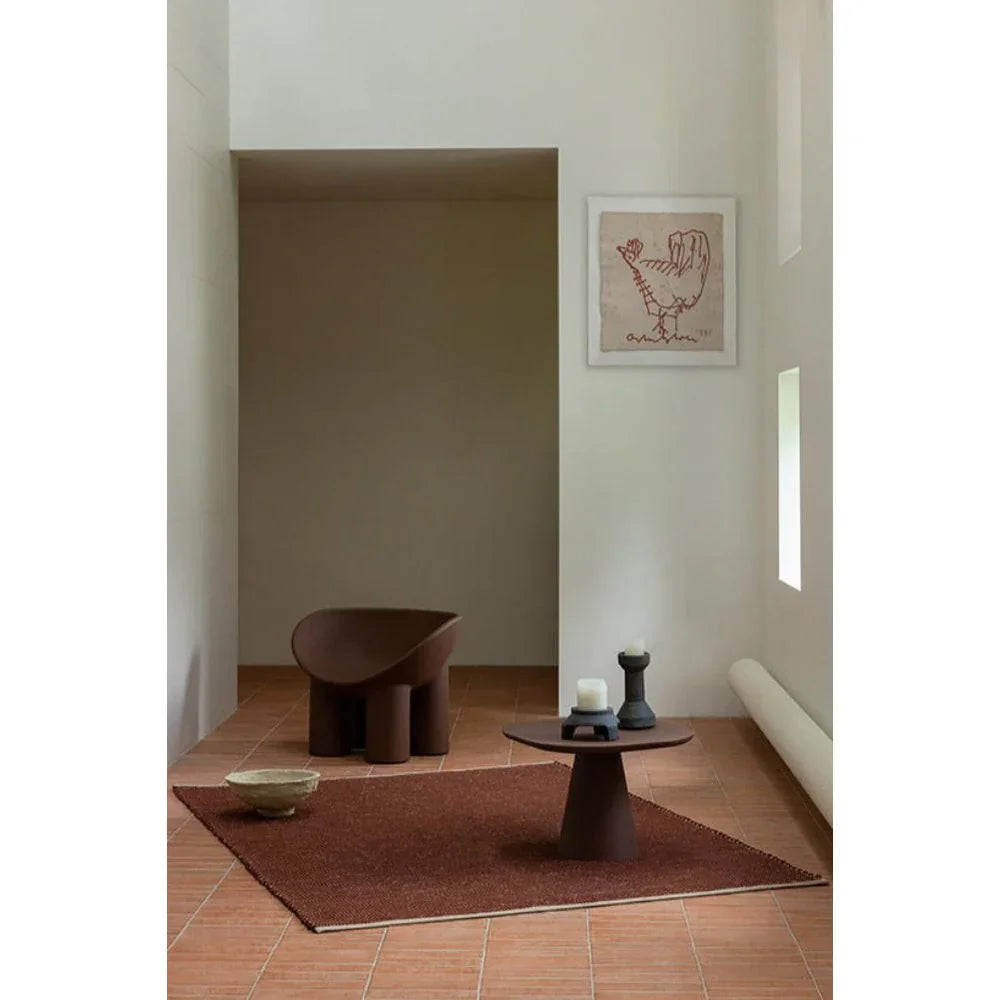 Brink & Campman Frame Brick Designer Rug featuring solid brick-red pattern in brick and terracotta on pale taupe background
