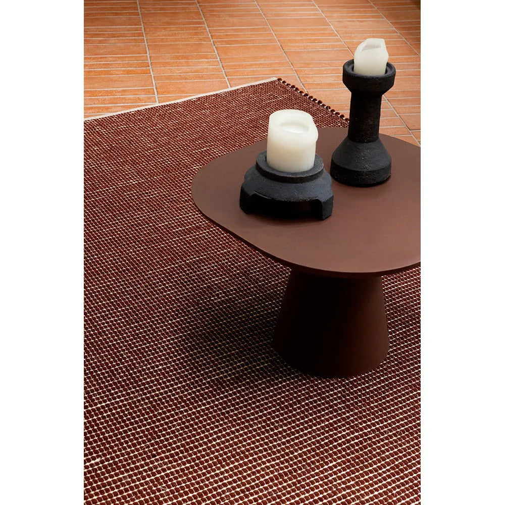 Brink & Campman Frame Brick Designer Rug featuring geometric grid in brick red and ivory on warm terracotta background, hand-tufted wool