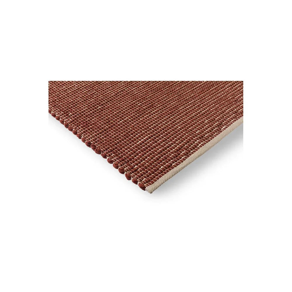 Brink & Campman Frame Brick Designer Rug featuring brick-textured loop in brick brown and cream on beige, hand-tufted wool-blend