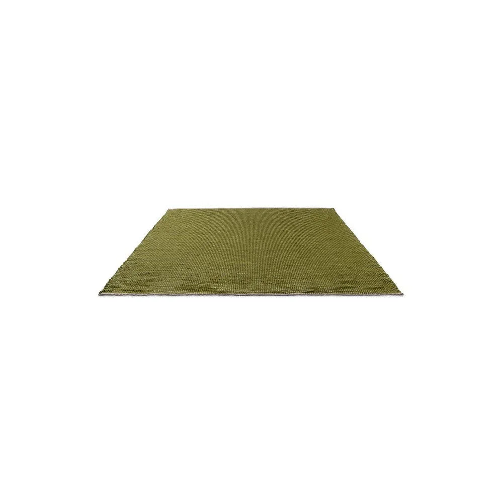 Brink & Campman Frame Leaf Designer Rug in olive-green textured weave on white background