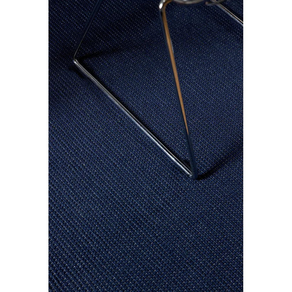 Brink & Campman Grid Ink Designer Rug featuring grid pattern in navy ink on deep blue background, woven construction, wool blend