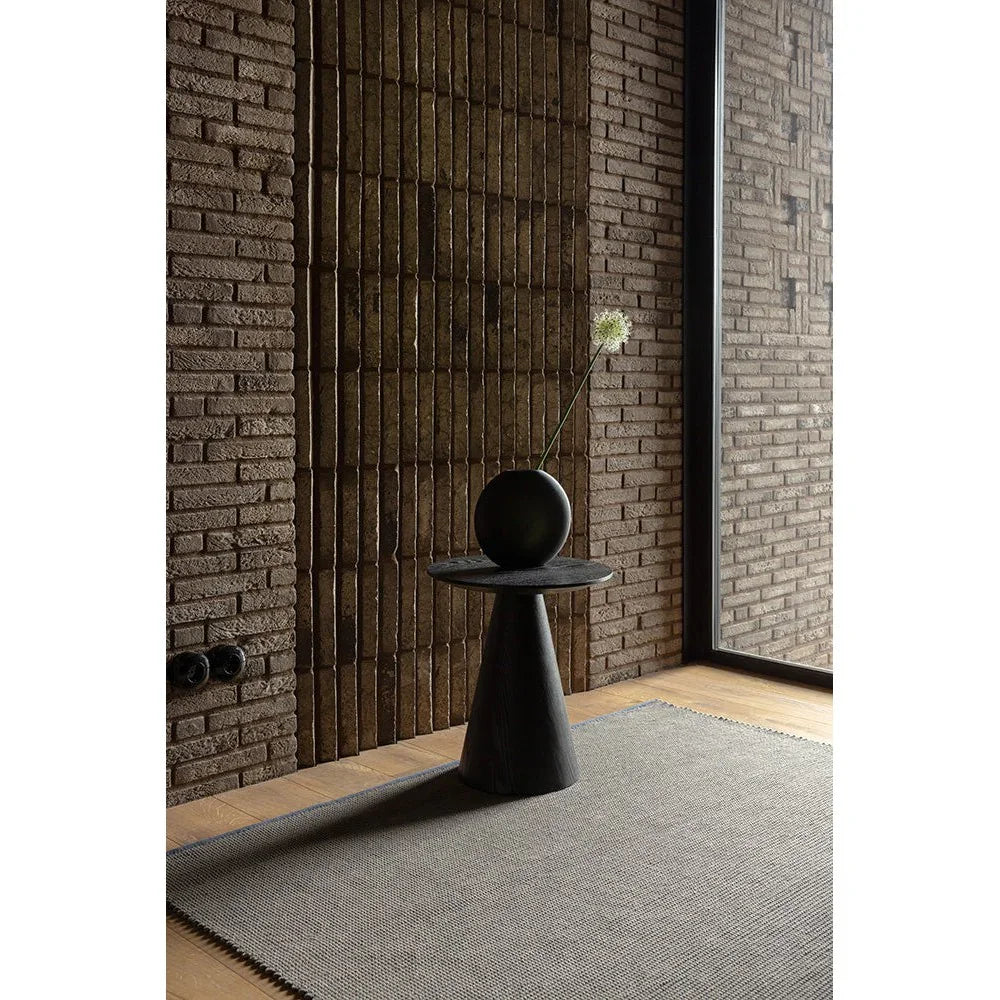 Brink & Campman Grid Stone Rug featuring minimalist grid in charcoal grey, dove grey and taupe on light grey background, hand-tufted wool