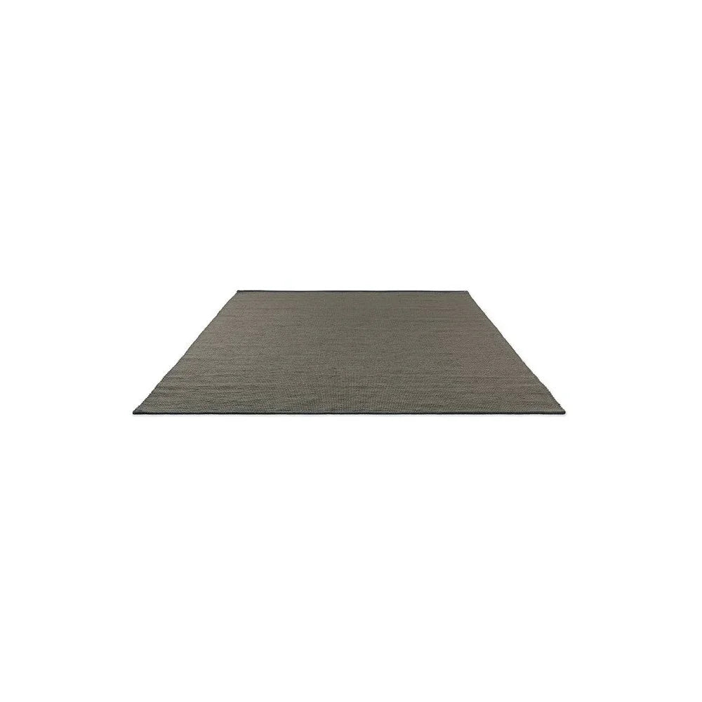 Brink & Campman Grid Stone Designer Rug featuring subtle grid pattern in stone grey and taupe on neutral grey background, hand-tufted wool