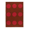 Brink & Campman Habitat Festival Dots Rug featuring polka dot pattern in crimson red on chocolate brown background, machine-made polypropylene
