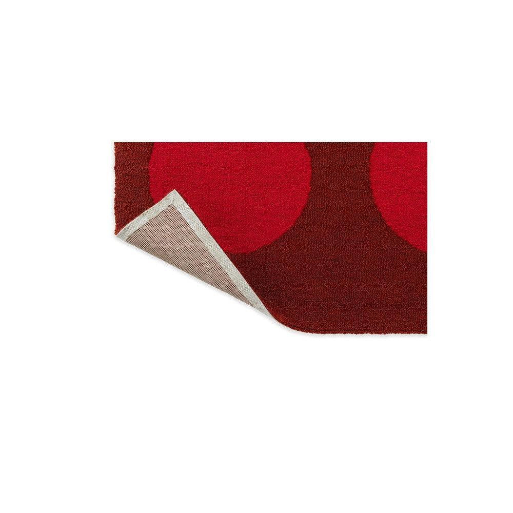 Brink & Campman Habitat Festival Dots Red outdoor rug with bold red dot pattern on burgundy background